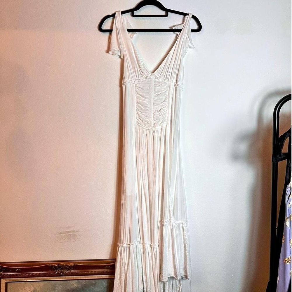 White maxi dress with ruched bodice and tiered dress